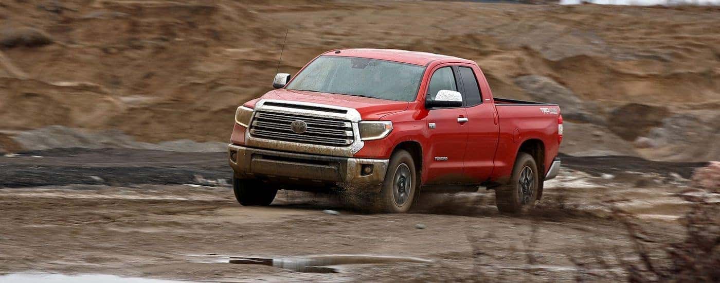 Dirty red 2018 Toyota Tundra on a Ohio job site