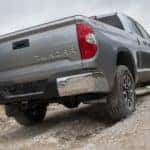 Rear shot of grey 2019 Toyota Tundra off roading