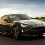 A new Toyota 86, black, TRD on a track