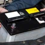 Mechanic Replacing Vehicle Battery