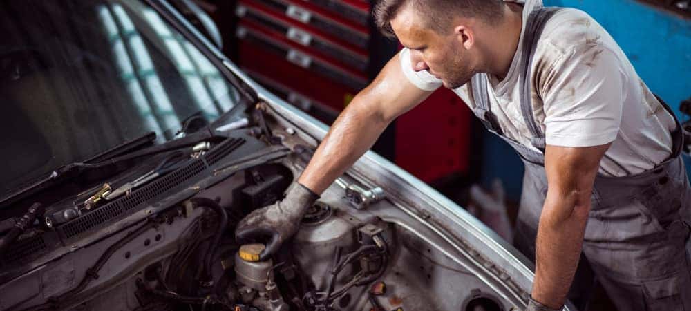 Mechanic working on Car