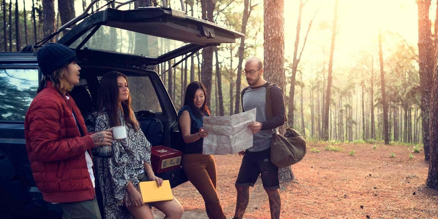 Friends off-roading on a camping trip