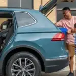 family outside SUV