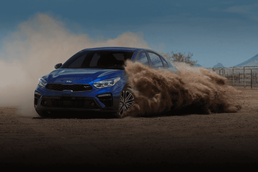 2020 Kia Forte driving in dirt