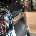 A closeup of the Buick SUVs logo on a 2019 Buick Envision
