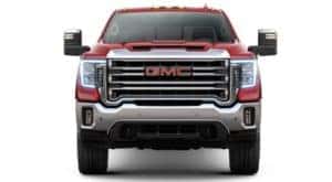 A red 2020 GMC Sierra 2500HD is facing forward with no background.