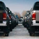 Two rows of used trucks are shown.