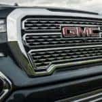 A close up of the grille of a grey 2019 GMC Sierra Denali is shown.