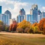 A view of Atlanta from Piedmont Park is shown.
