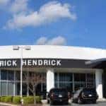 The front of the Rick Hendrick Buick GMC Duluth building is shown and is part of the Hendrick Automotive Group, which are some of the best used car dealerships.
