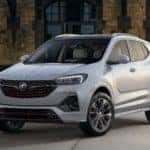 A white 2020 Buick Encore GX is parked in front of an industrial building near Atlanta, GA.