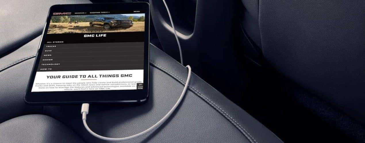 A close up shows a tablet on the rear seat in a 2021 GMC Canyon.