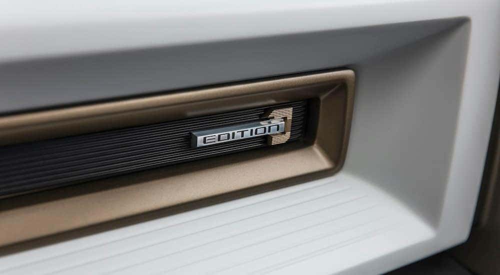 A close up shows the "Edition 1" logo in a 2021 GMC Hummer EV Pickup First Edition.