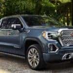 A 2021 GMC Sierra Denali is shown parked in a driveway after visiting a used GMC dealership in Atlanta.