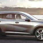 A silver 2022 Buick Envision is shown from the side after the owner searched 'Buick SUVs'.