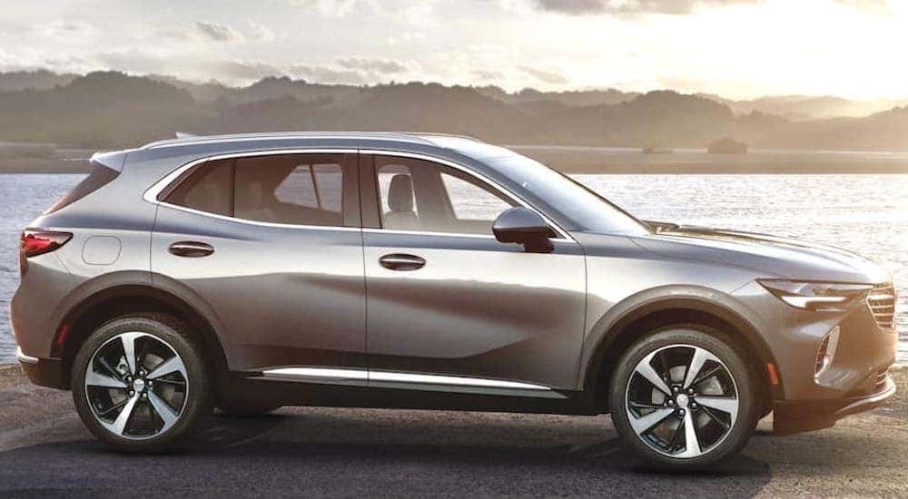 A silver 2022 Buick Envision is shown from the side after the owner searched 'Buick SUVs'.