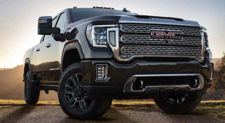 A black 2021 GMC Sierra 2500 is shown from the front.