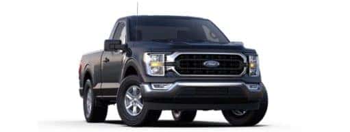 A black 2023 Ford F-150 XLT is shown angled right.