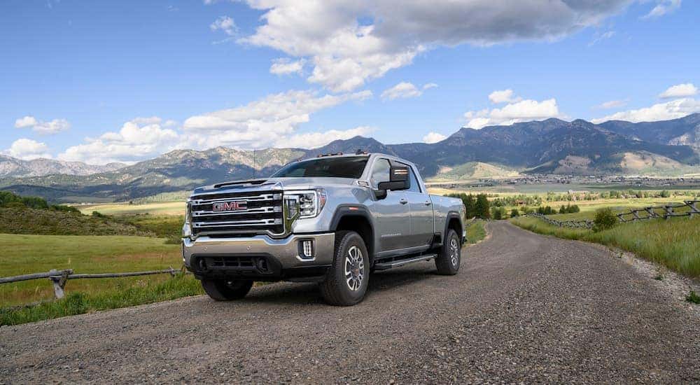 A silver 2023 GMC Sierra 2500HD is shown from the front at an angle.