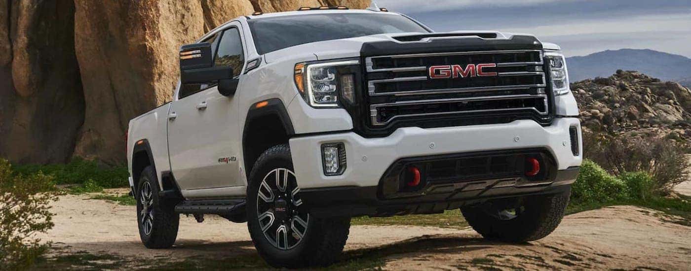 A popular GMC Sierra 2500 for sale, a white 2022 GMC Sierra 2500 HD AT4, is shown from the front.