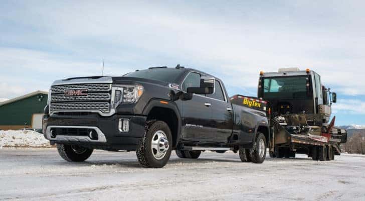 A black 2020 GMC Sierra 3500HD is shown from the front at an angle.