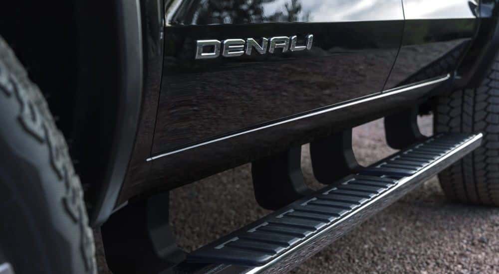 A close up shows the Denali badge on a 2023 GMC Canyon for sale.