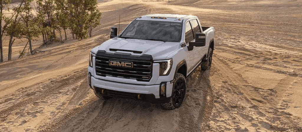 Embark on a journey of excellence with the 2024 GMC Sierra 1500, a vehicle that continues to set new standards in the full-size truck segment. Renowned for its exceptional blend of performance, safety, technology, and versatility, the Sierra 1500 stands as a testament to GMC's commitment to innovation and quality. As you explore its various trim levels, from the practical yet capable Sierra Pro to the luxurious Sierra Denali Ultimate, you'll discover a range of options tailored to meet your specific preferences and requirements. Whether your priority is impressive towing capacity to tackle heavy loads with ease, fuel efficiency for long journeys and everyday commuting, or advanced features that enhance connectivity and convenience, the Sierra 1500 delivers on all fronts.Whether you're navigating urban streets or venturing off the beaten path, the 2024 GMC Sierra 1500 embodies excellence in every aspect, making it a top choice for discerning drivers seeking unparalleled performance and versatility in a full-size truck.