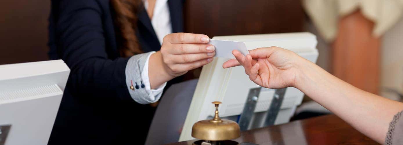 Front Desk Receptionist with Key Card