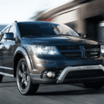 2020 Dodge Journey driving fast on city highway