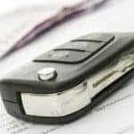 Car Key and Pen on Contract