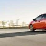 Red 2019 Corolla on the highway