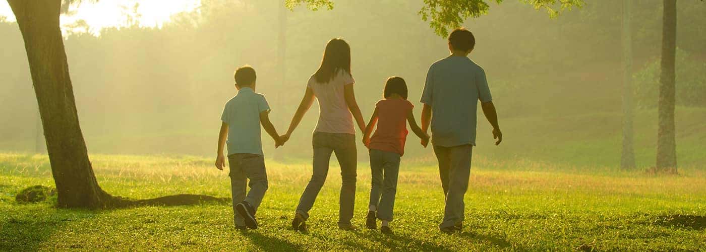 Family walking in a park
