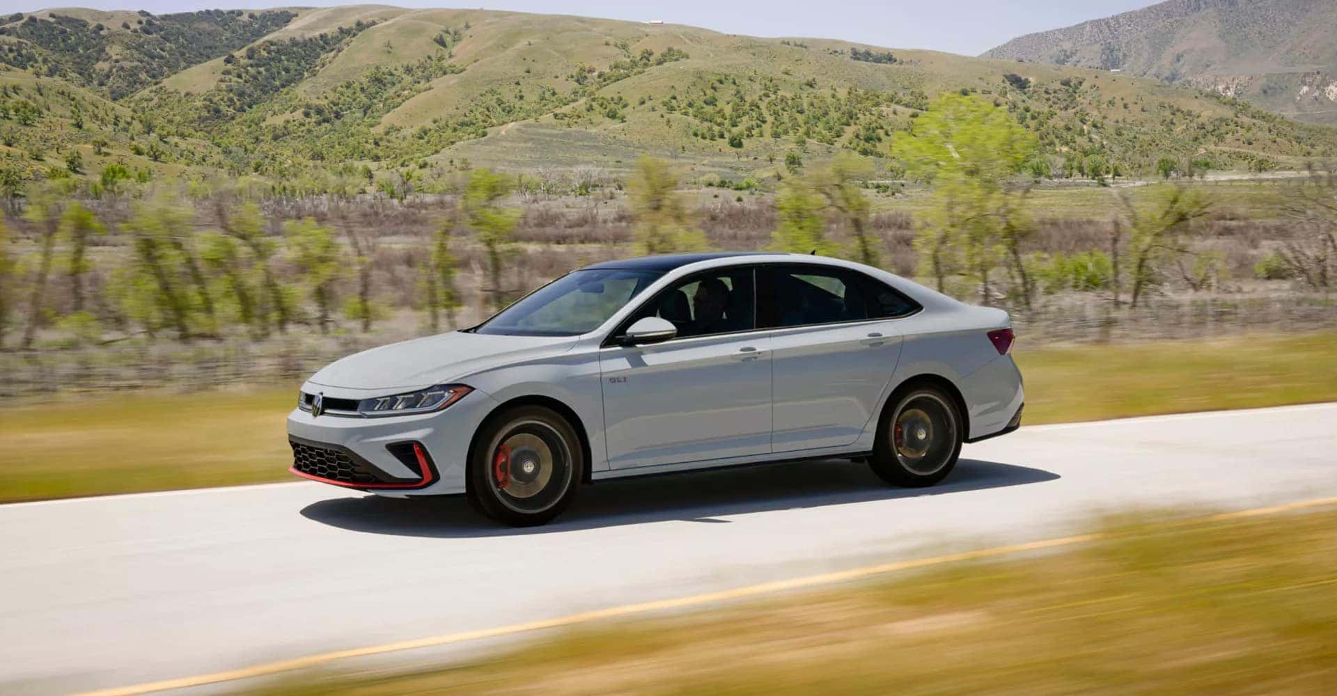 2025 Volkswagen Jetta GLI Driving Down the Road