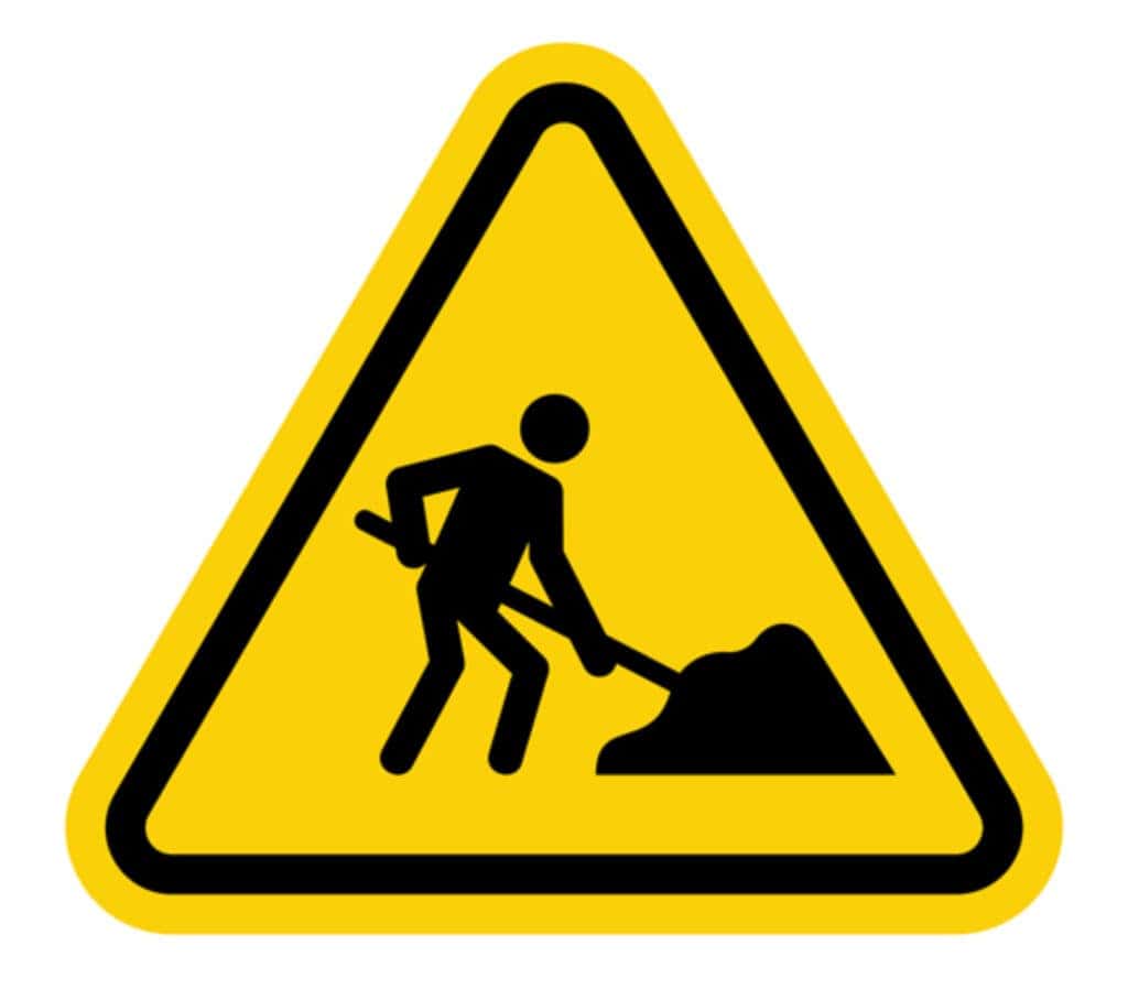 men at work road sign