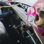 adding car coolant