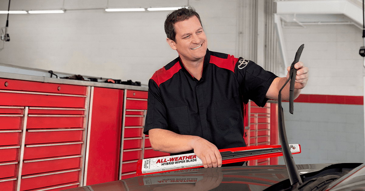 Toyota technician installing wipers