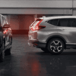 two honda cr-v configurations in parking garage