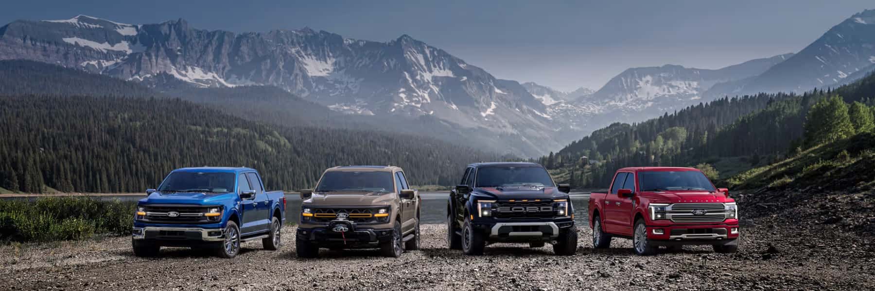 Trucks in front of a Mountain